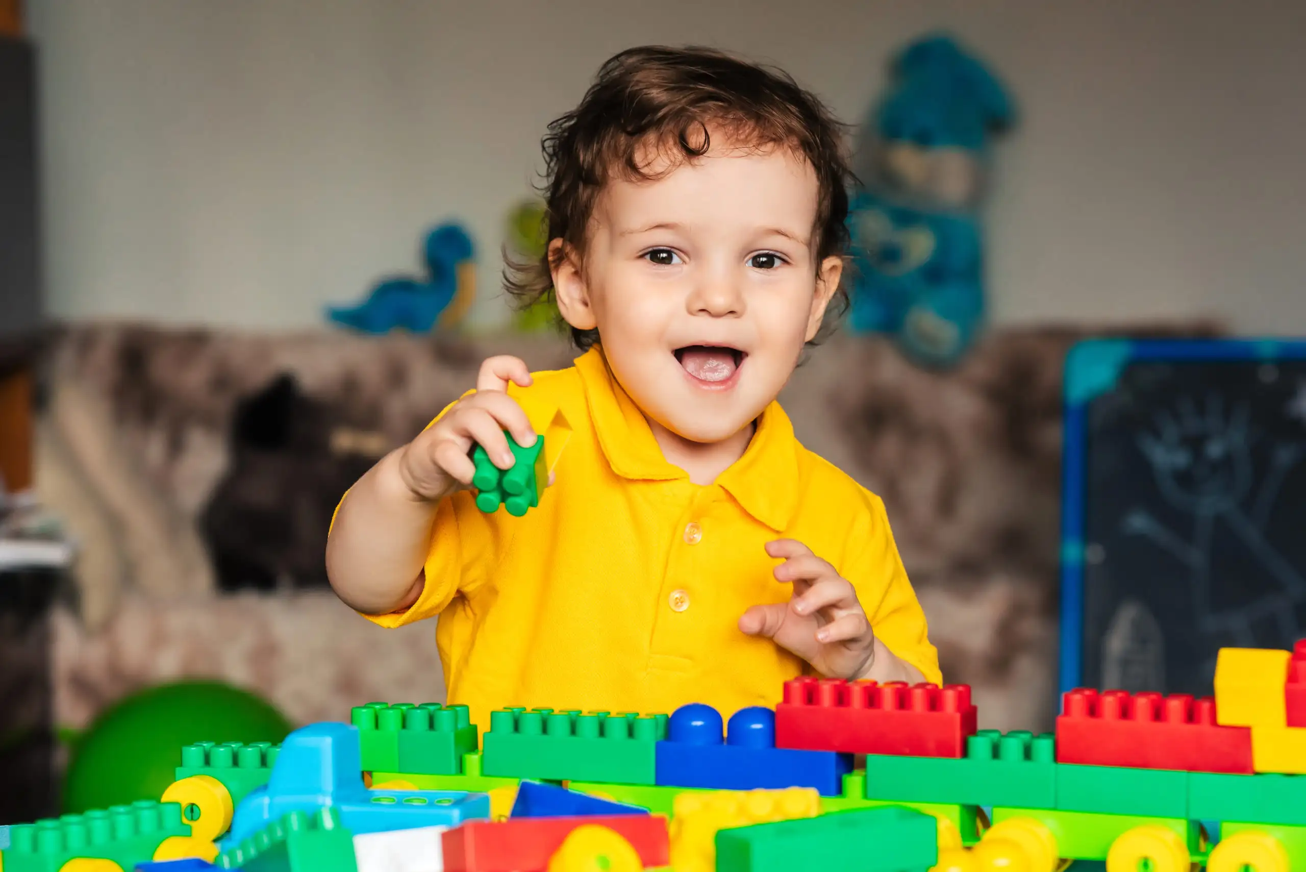 cute-little-boy-child-playing-home-with-colorful-cubes-scaled_691d84e669005 cute-little-boy-child